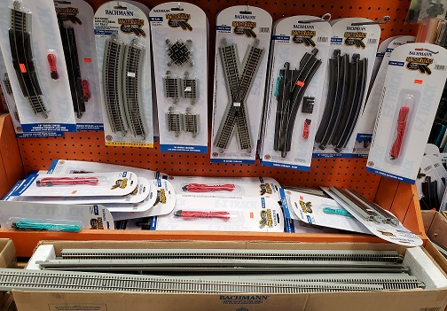 We have a good selection of HO Scale
Bachmann EZ-Track in packages and bulk. Black or grey roadbed.