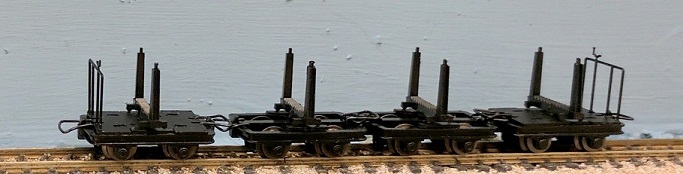 4 Log Cars, 2 with brake plastic box